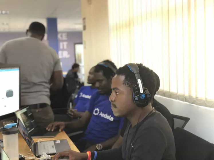 Engineers at work in an Andela workspace